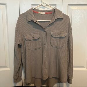 Tan waffle knit button up shirt with red accents #autumnvibes